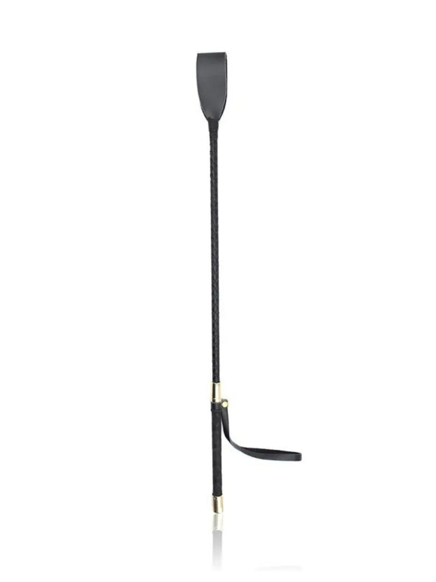 Whip standing upright against a white background, showing its full length with the wrist loop hanging near the handle 4
