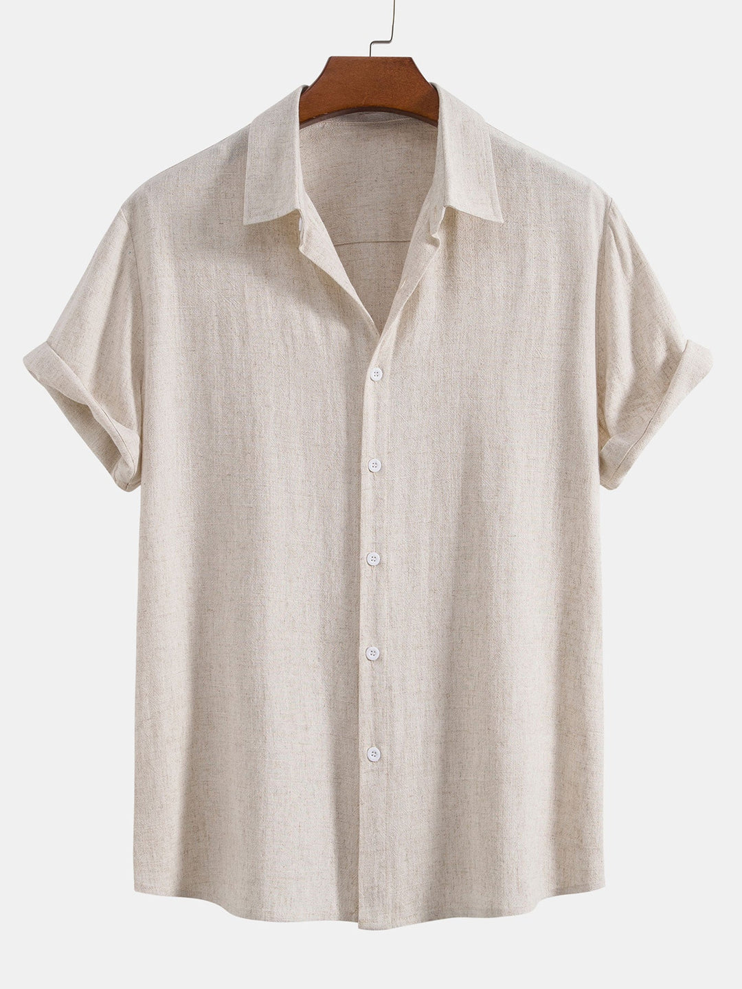 Light beige shirt with a speckled linen texture on a wooden hanger, buttoned front and rolled sleeves.