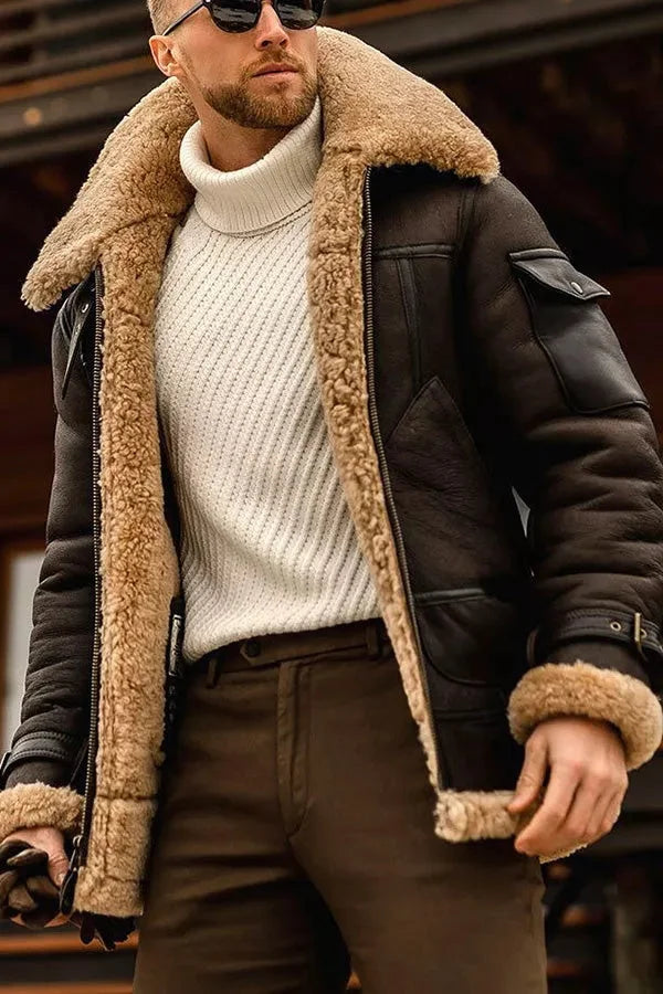 Model wearing the jacket in dark brown leather with a tan shearling collar and cuffs, over a cream turtleneck 7
