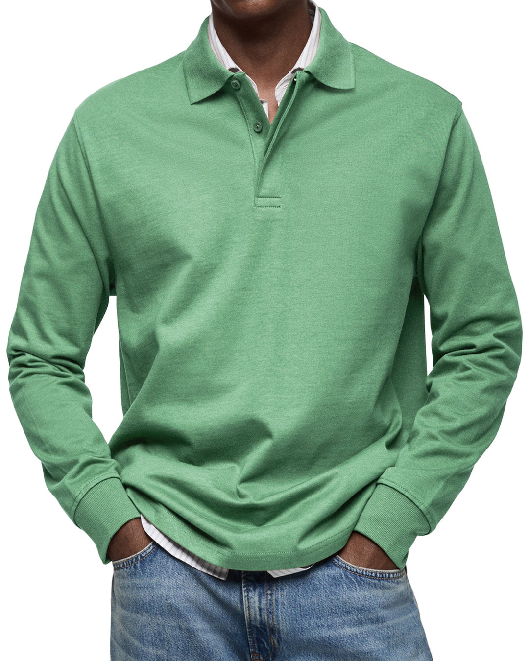 Man wearing the long sleeve polo shirt in soft green, another view.