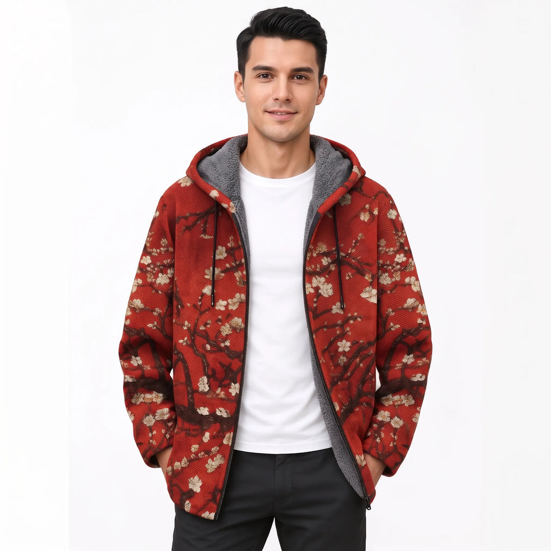 Man smiling in the open red hooded jacket covered with white blossoming branches and gray fleece lining 20
