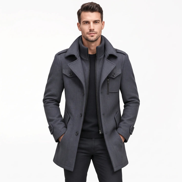 Model wears the gray coat open over a black sweater and black pants 20