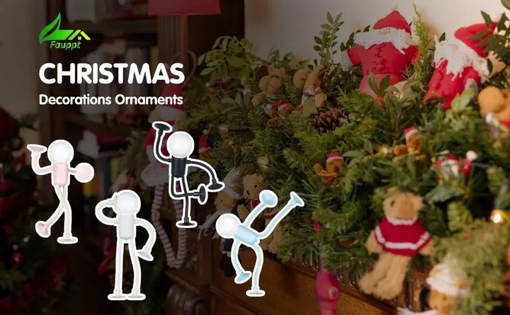 Four figure lights in pink, white, black and blue overlaid on a Christmas garland with Santa and bear decorations 20