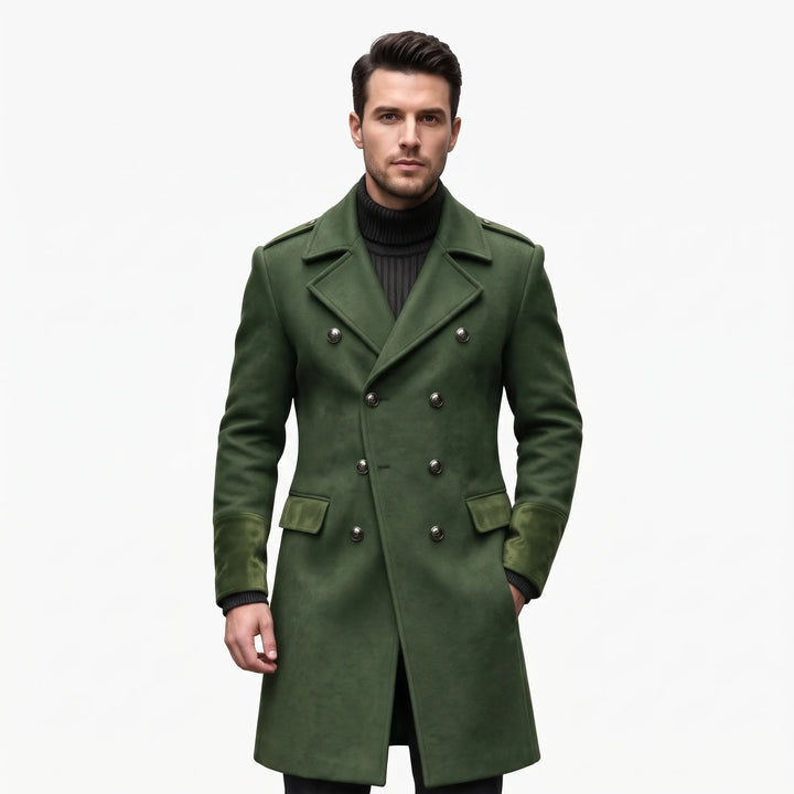 Man wearing the overcoat in olive green with suede-look cuffs and flaps, one hand in pocket 23