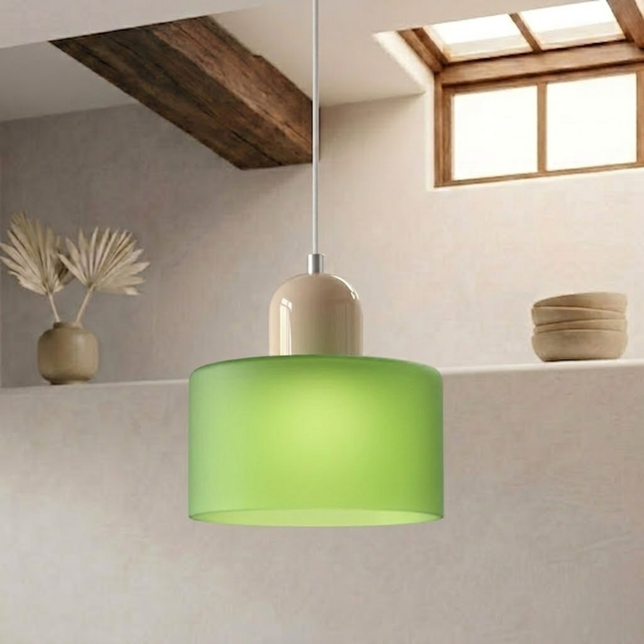 Frosted green drum shade with a beige dome cap hangs from a white cord in a plaster-walled room. 29