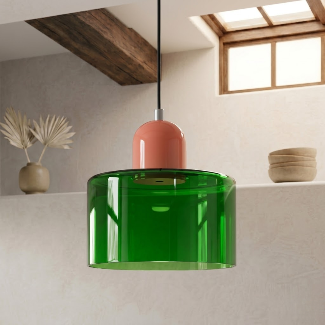 Translucent green glass shade with a coral pink dome cap hangs on a black cord, shown from below. 30