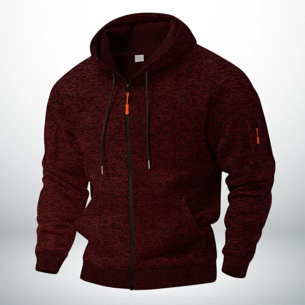 Front view of the hoodie in heathered burgundy, showing the drawstrings, kangaroo pocket and zippered sleeve pocket 2