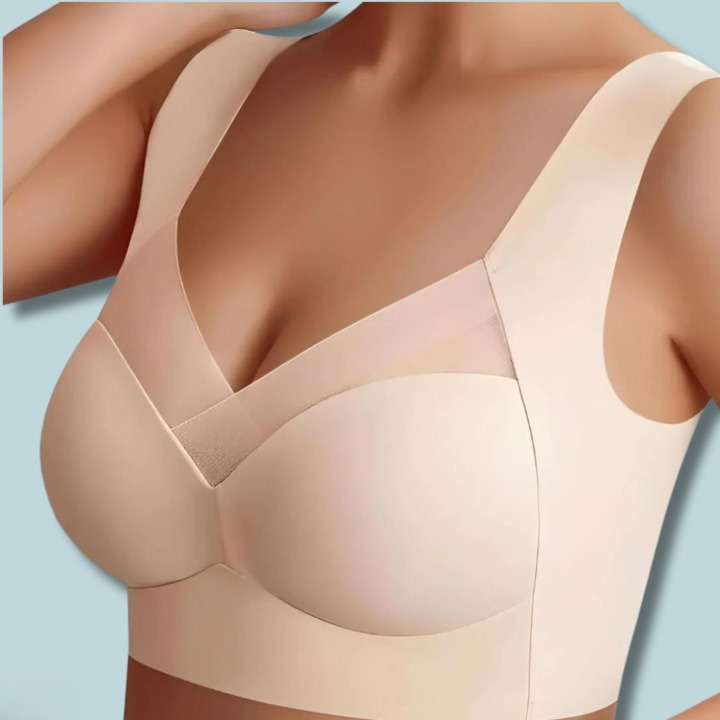 Seamless Ultra-Comfort Bra in beige with seamless cups, mesh panel at the neckline and broad straps.