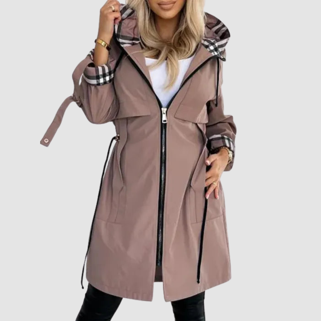 Mauve-brown hooded coat open over a white top, showing plaid hood lining, rolled plaid cuffs and drawstring waist.