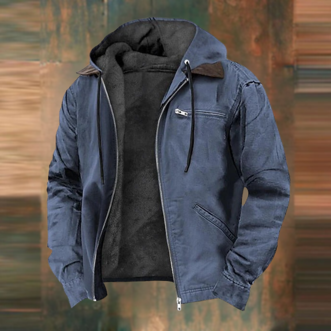 Same hooded jacket in slate blue, unzipped to show the soft dark fleece lining, drawstrings and brown collar patch. 3