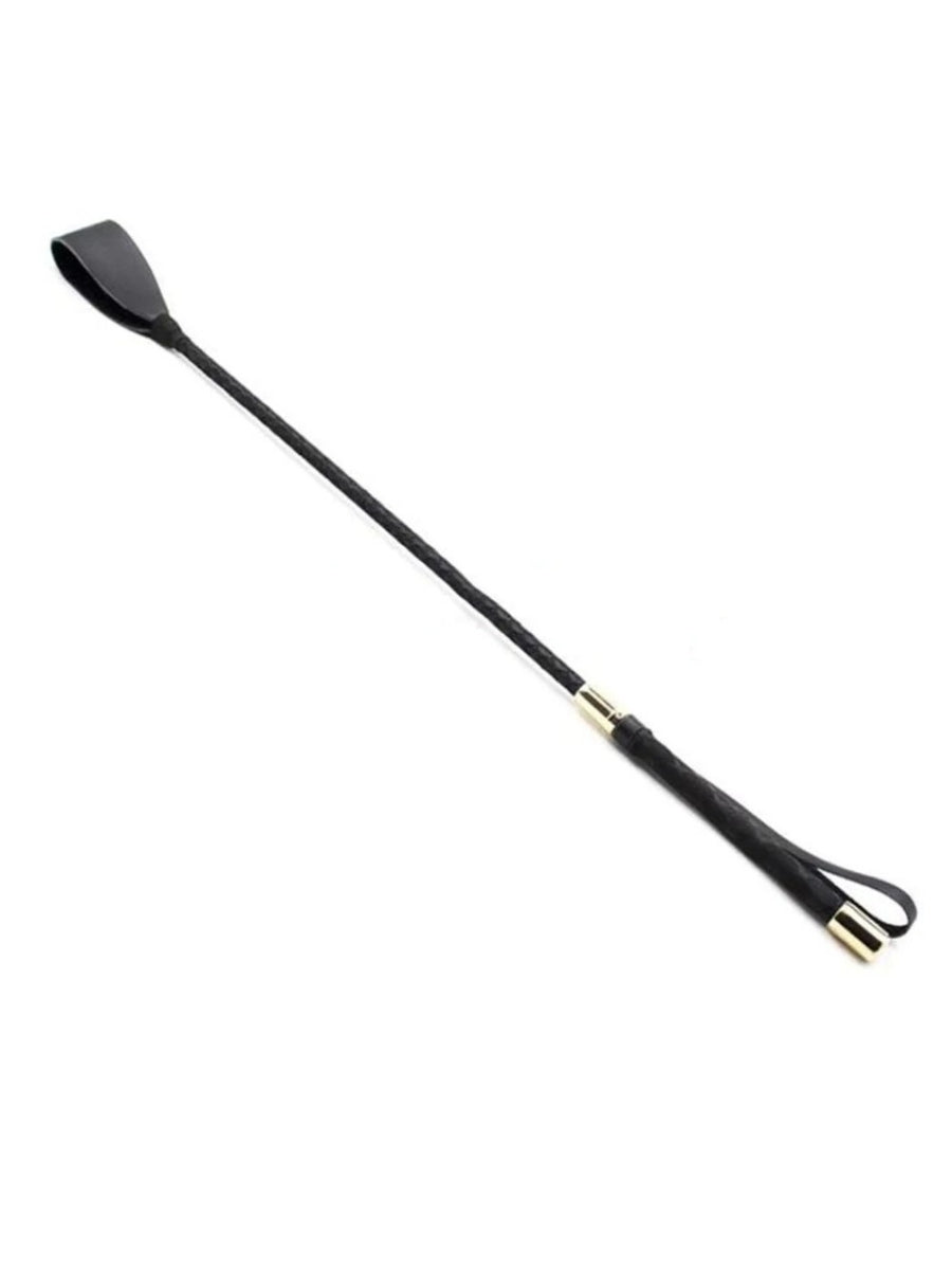 Full black riding crop lying diagonally, with a flat leather tip, braided shaft and gold-tone end caps 1