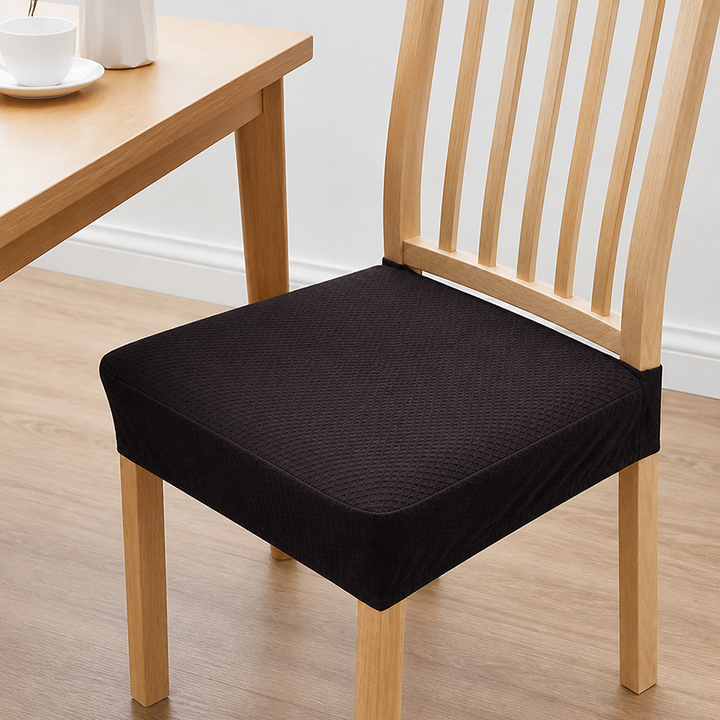 Dark brown textured seat cover on a light wood chair, another view.