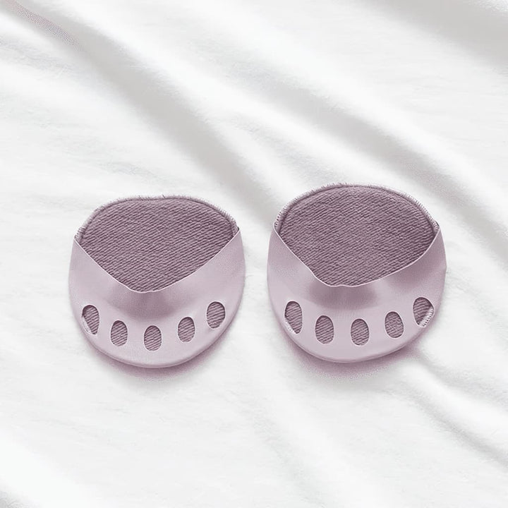 Pair of pale mauve forefoot cushions with textured pads and five toe openings laid flat on white fabric.