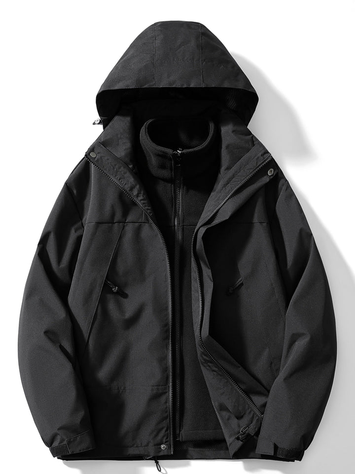 All-black hooded jacket with zipper pockets, unzipped to reveal the black fleece liner underneath 2