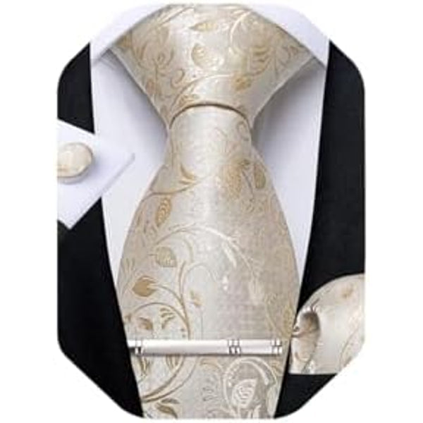 Cream and champagne tie set with a gold leafy vine pattern, shown with matching cufflink, pocket square and silver tie clip.