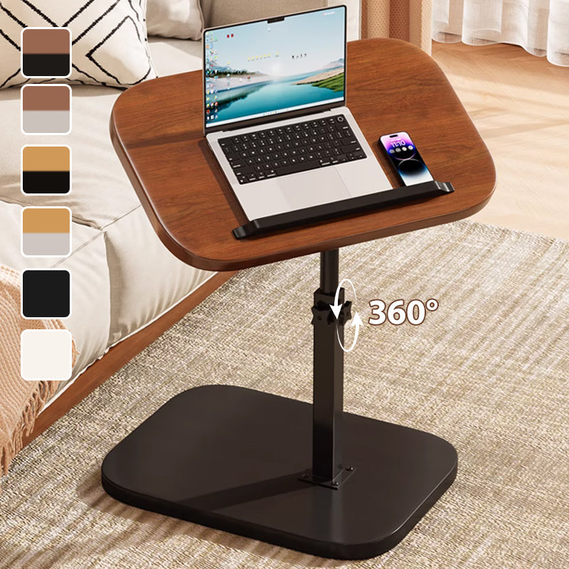 Black height adjustable rolling laptop desk with 360° swivel top beside a sofa