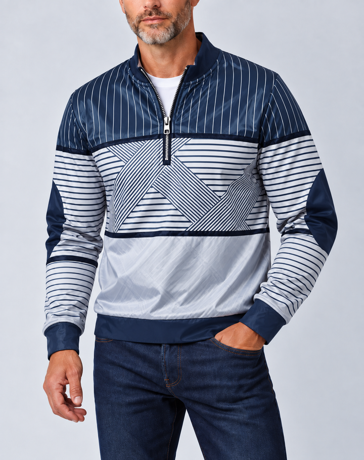 Bearded man wearing the navy and white striped half-zip pullover with a white tee and dark jeans 1