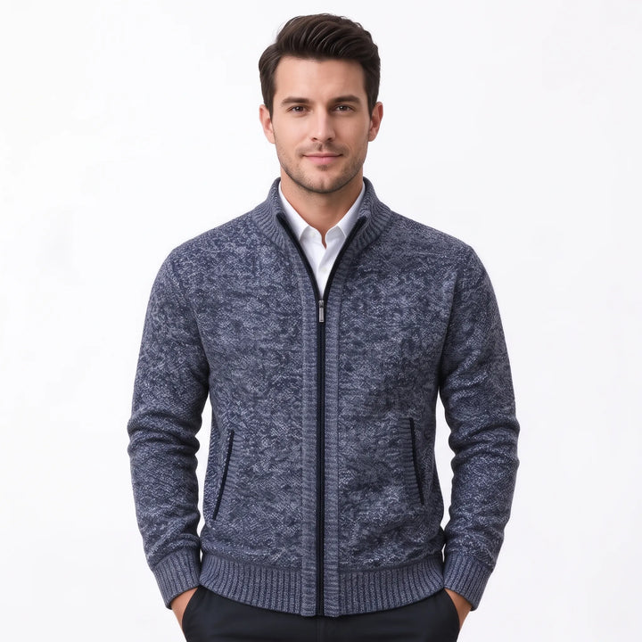 Model wearing a heathered blue-gray knit zip cardigan with hands in pockets 35