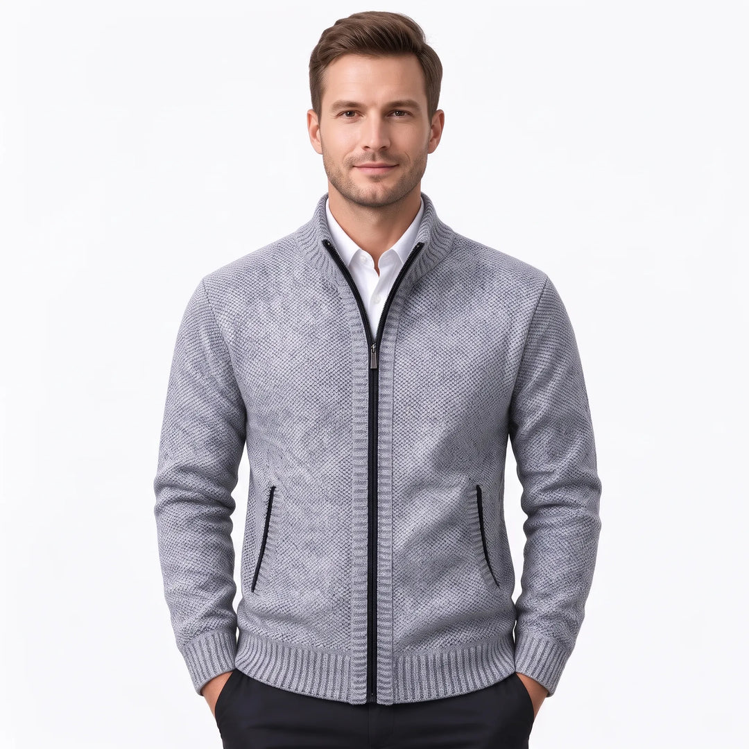 Model wearing a light gray knit zip cardigan with black zipper over a white shirt 36