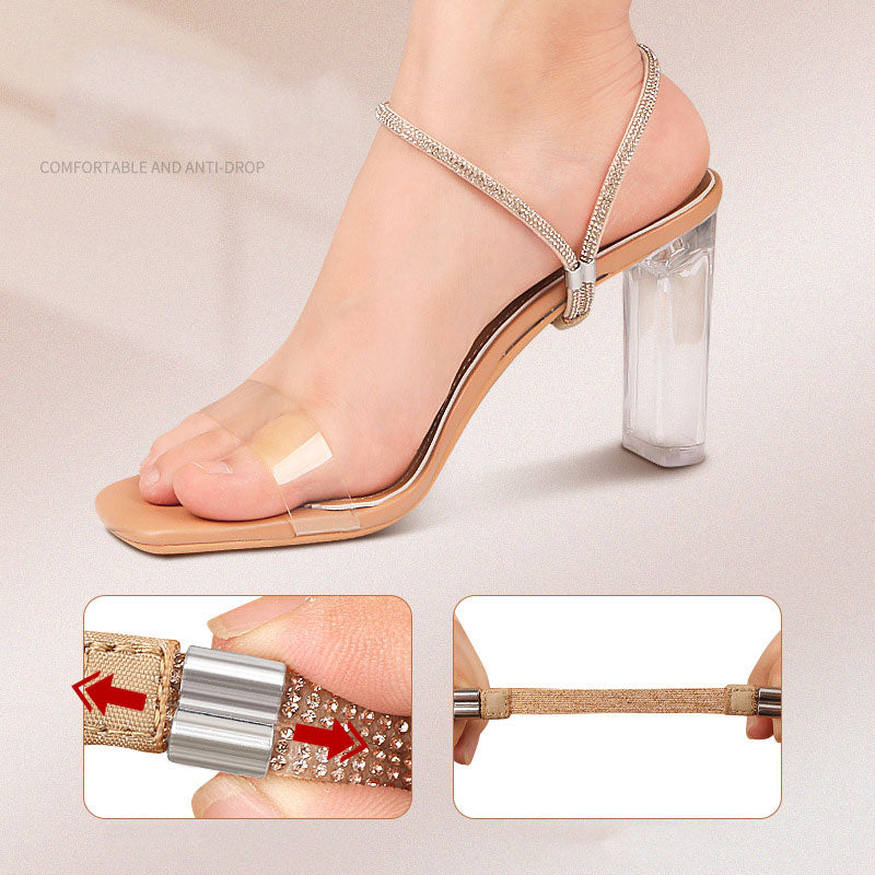 Foot in a clear-heeled sandal with a crystal strap and close-ups of the sliding metal clasp and stretchy elastic band.