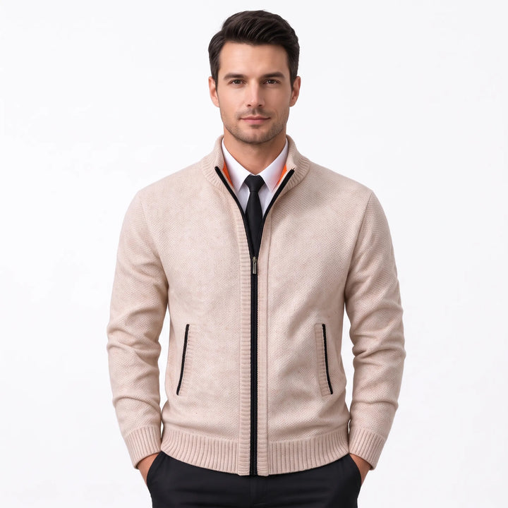 Model wearing a beige knit zip cardigan with white shirt, black tie and orange collar lining 38