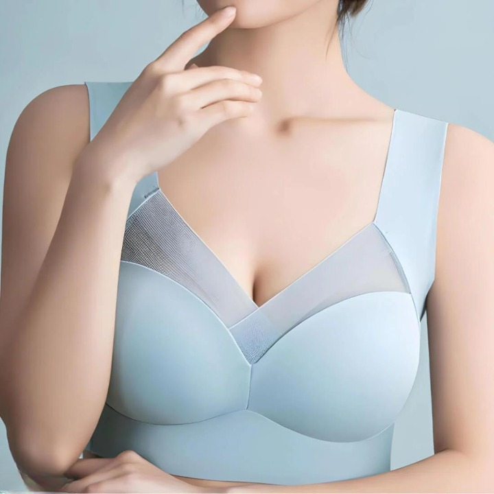 Seamless Ultra-Comfort Bra in light blue with a mesh V-neckline and smooth cups.