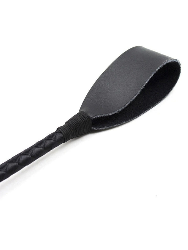 Close-up of the flat black leather tip, wrapped at the base where it joins the quilted shaft 2