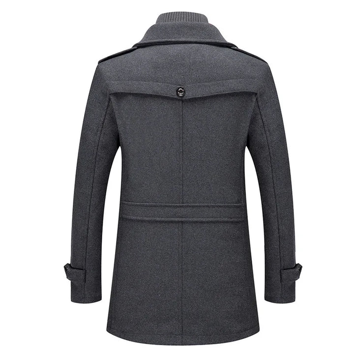 Back view of the gray overcoat, showing the back yoke, button, waist strap and cuff tabs 3