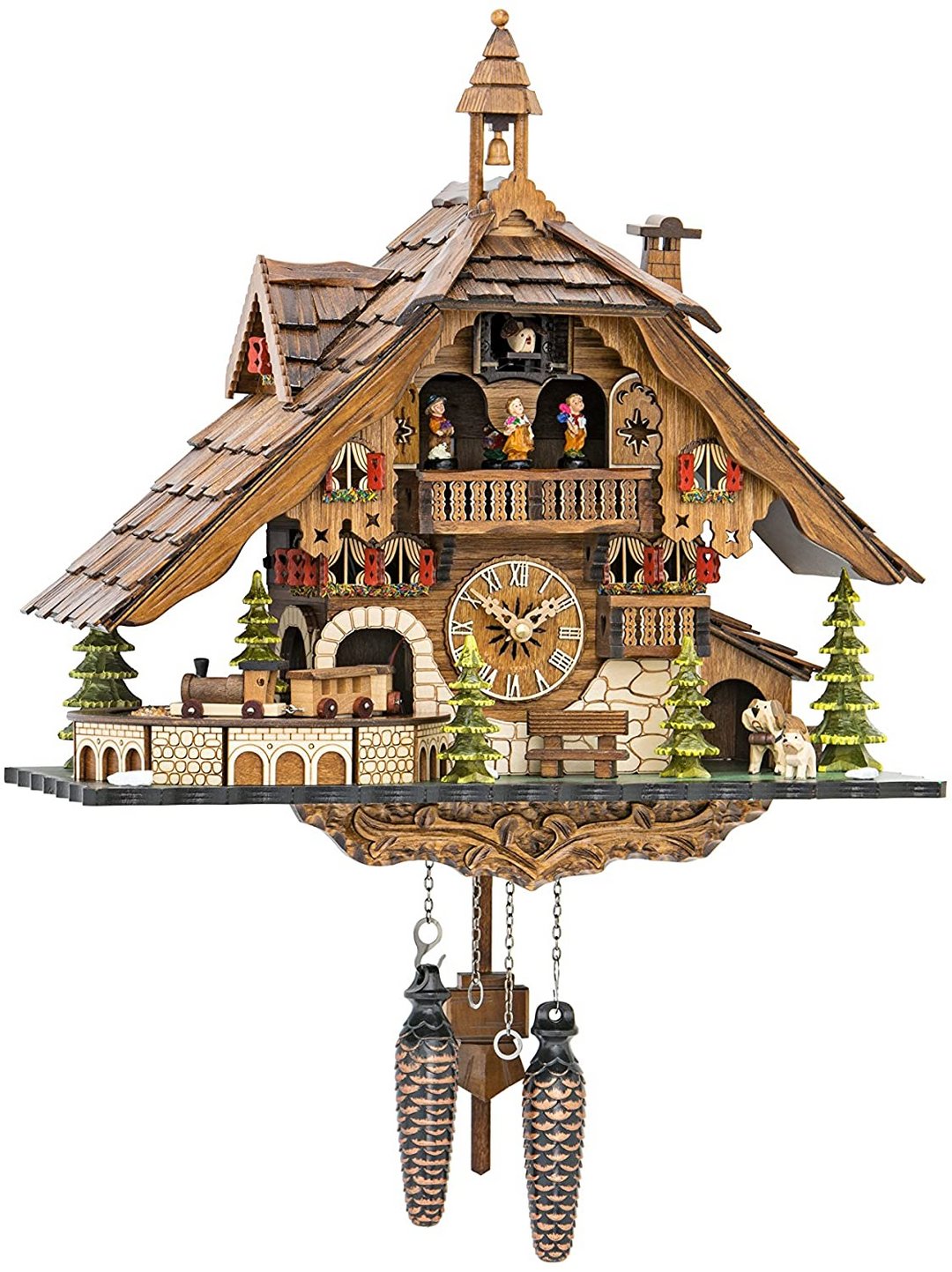 Carved wooden chalet clock with shingled roof, bell tower, dancers on balcony, toy train and pine trees 1