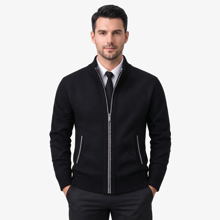 Model wearing a black knit zip cardigan with gray zipper trim, shirt and tie 40