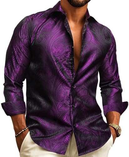 Model wearing the long-sleeve button-up shirt in purple and black paisley jacquard, collar open, hands in cream trousers.