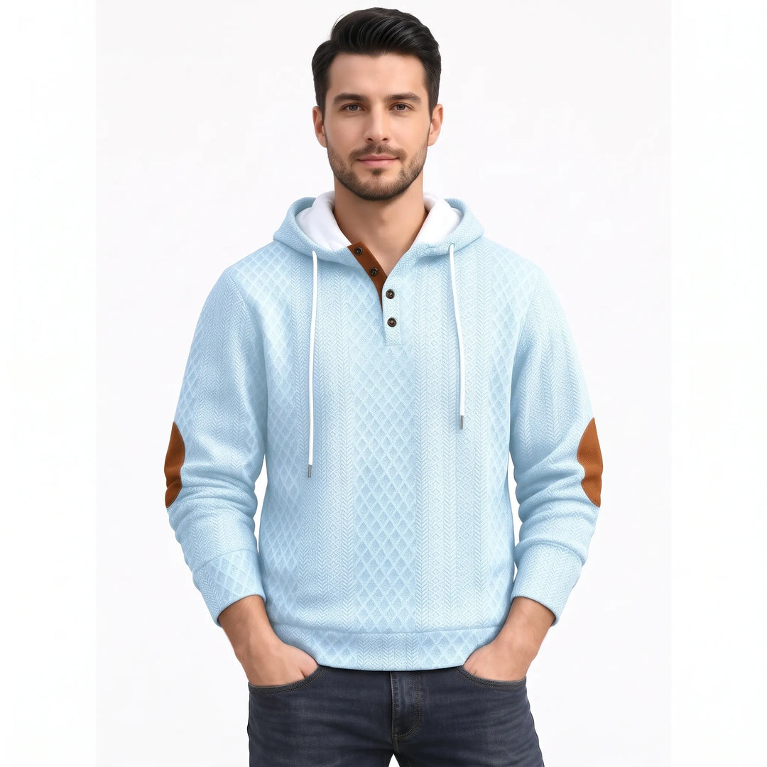 Man wearing light blue diamond-textured hoodie with white hood lining, brown button placket and brown elbow patches 42