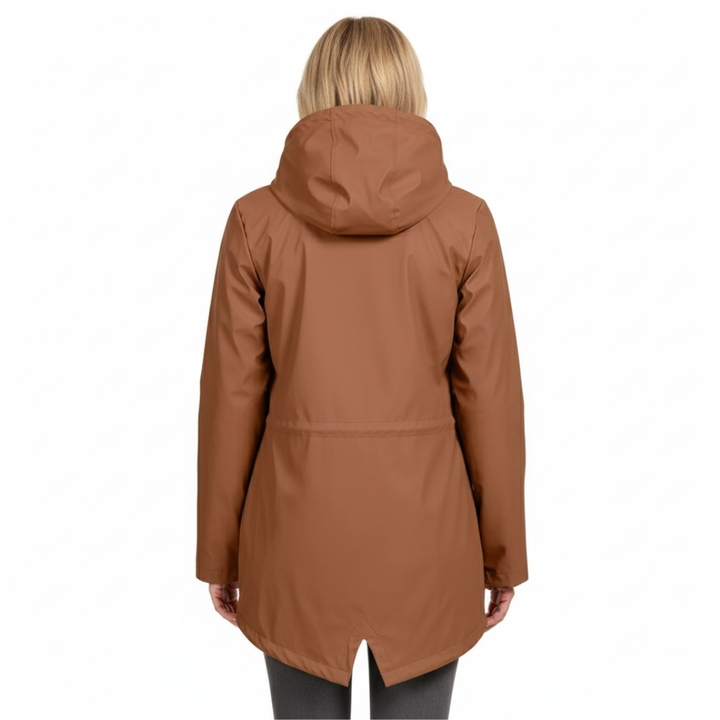 Back view of a woman in the rust-brown hooded jacket, showing the hood, drawstring waist and curved vented hem.
