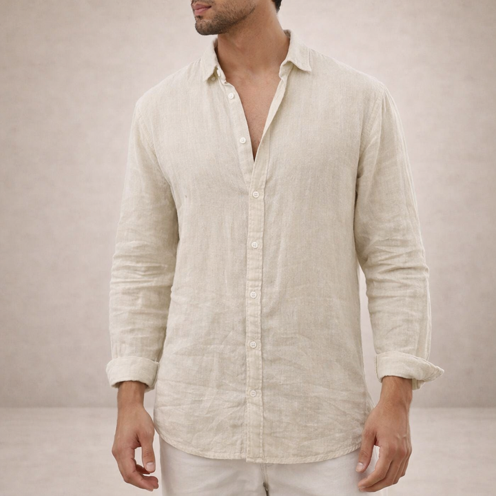 Model wearing the natural beige linen shirt, relaxed collar and rolled sleeves.