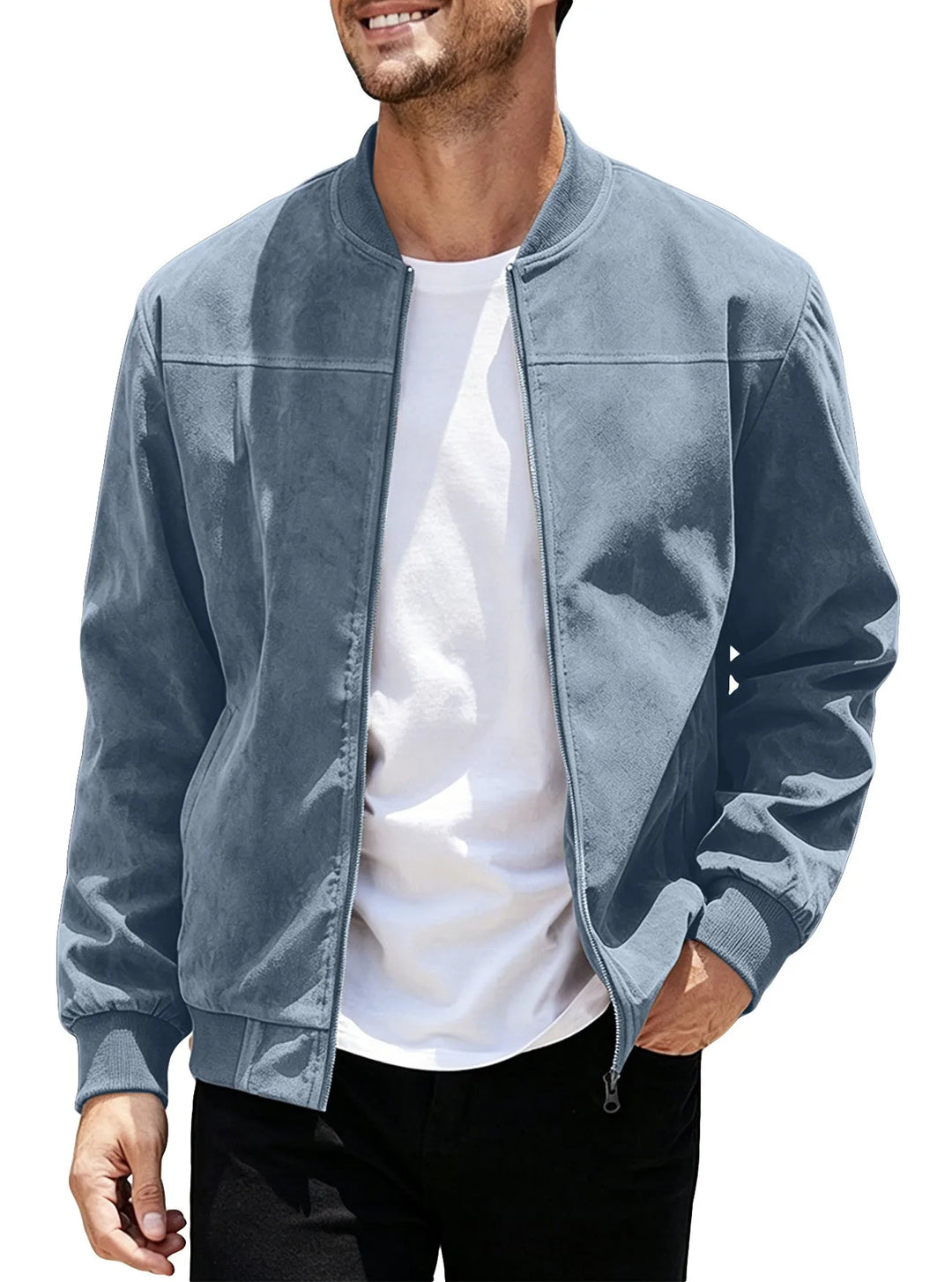 Man wearing the dusty blue zip-up bomber open over a white tee, hand in pocket 47