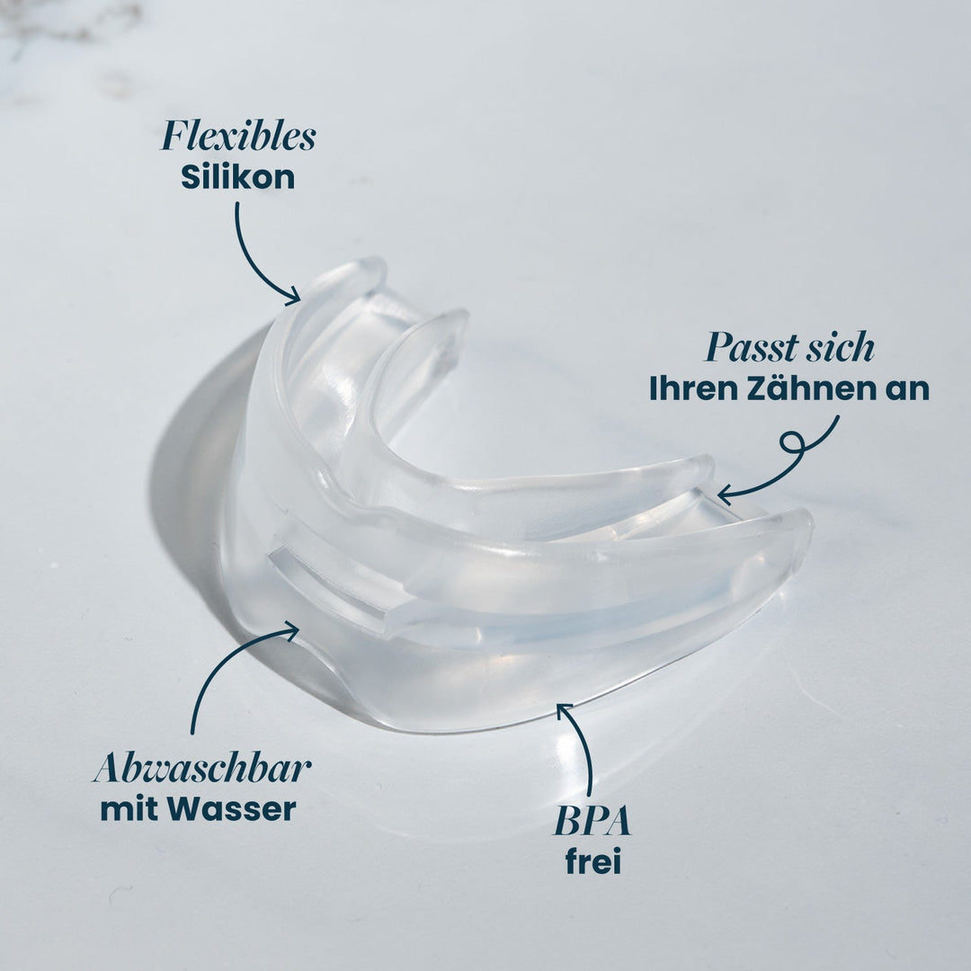 Close-up of the clear flexible silicone recovery mouthpiece with German labels highlighting its features.