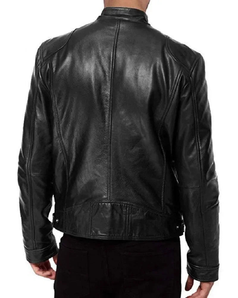 Back view of a black leather jacket on a model, showing seams and waist tab 4