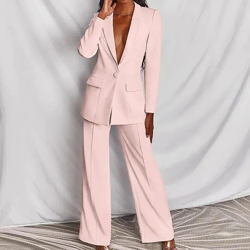 Front view of the light pink suit showing flap pockets and a center crease on the pants 4