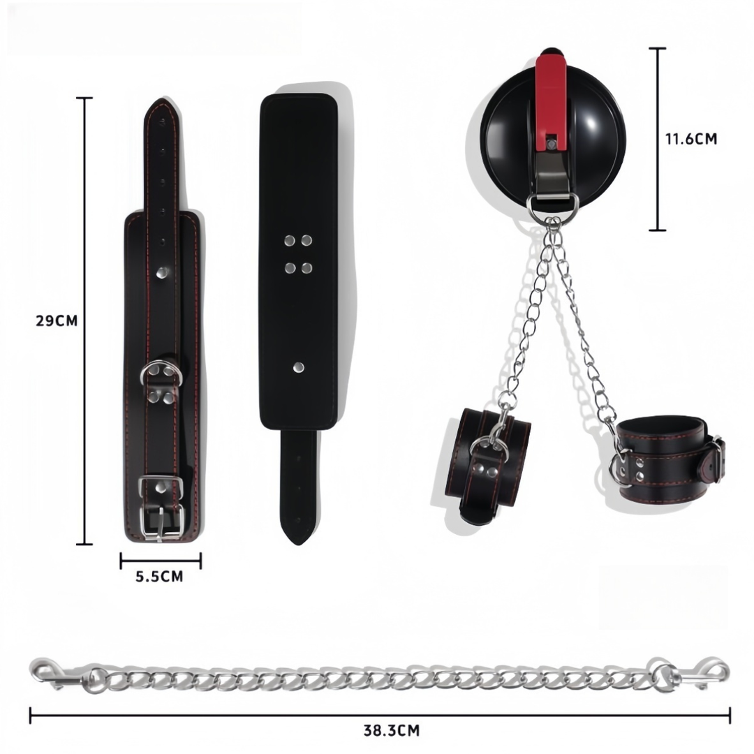Dimension diagram of black buckle cuffs with red stitching, shown with the suction mount, silver chains and measurements. 10