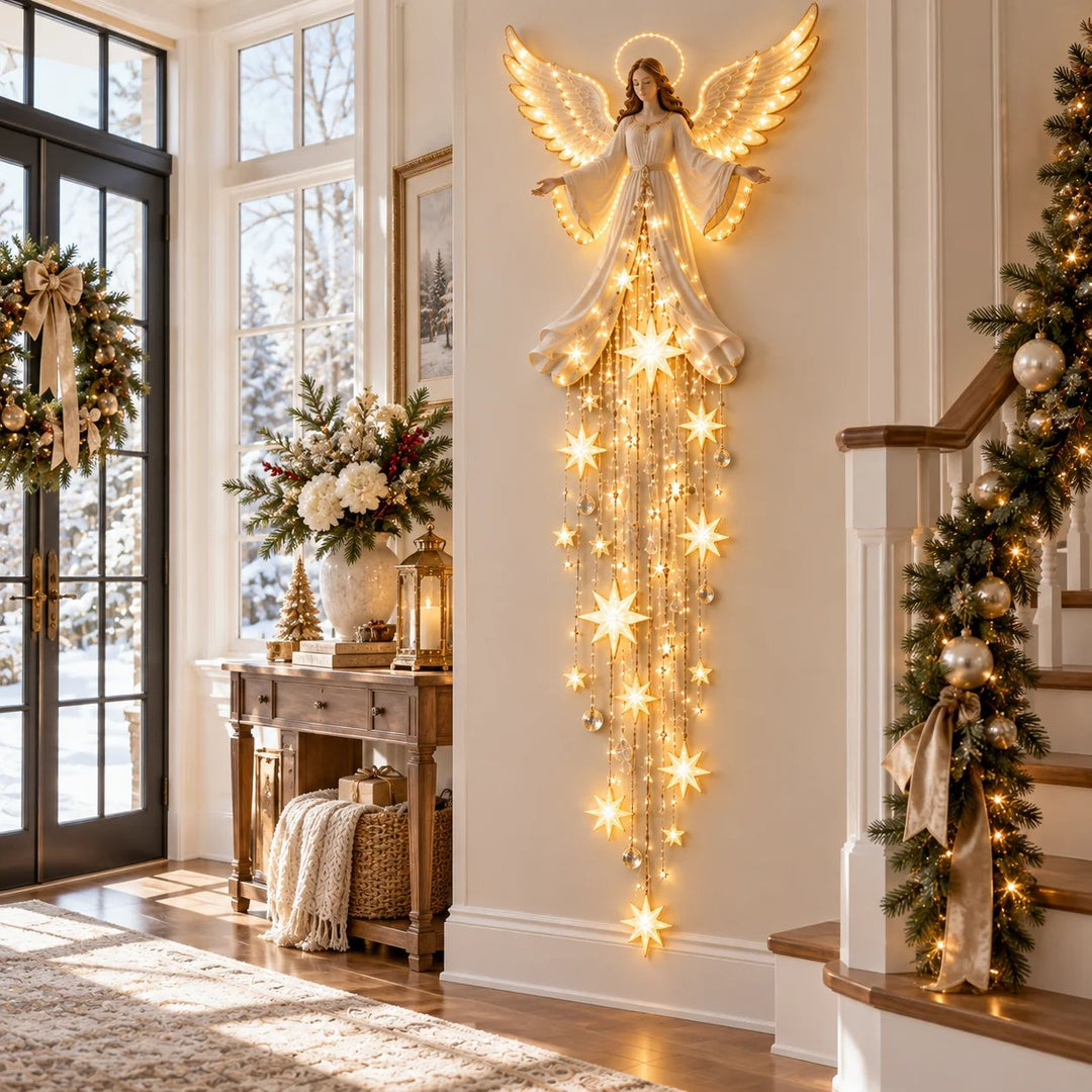 Lit angel wall light with a long starfall cascade on a cream wall, detail