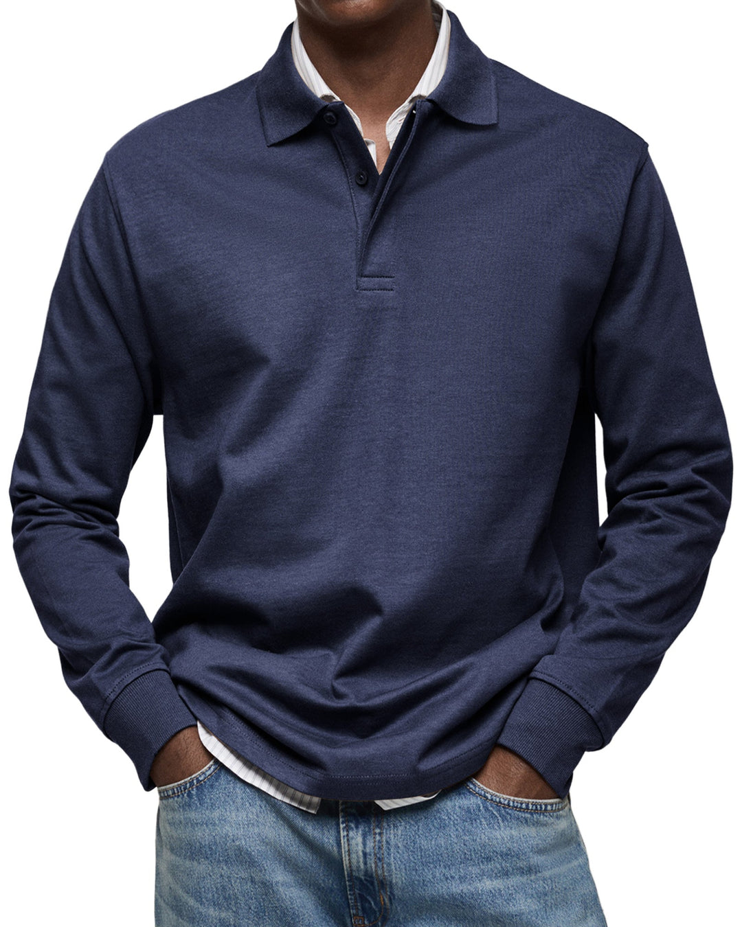 Man wearing the long sleeve polo shirt in deep navy, another view.