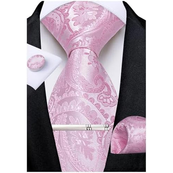 Light pink tie set on a white shirt and black jacket, with matching cufflink, pocket square and tie clip.