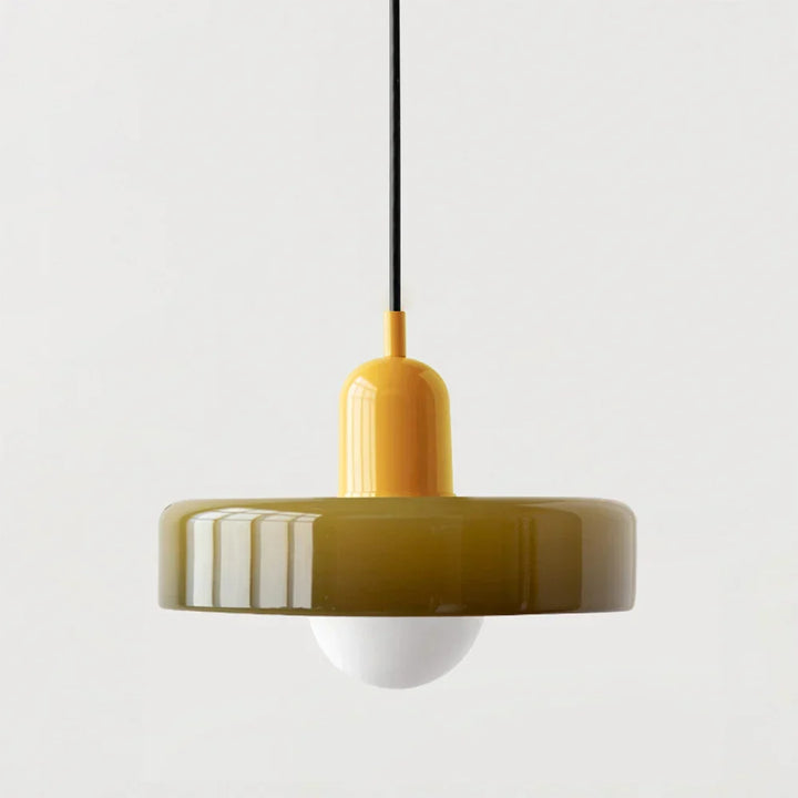 Bauhaus Stained Glass Pendant Lamp with a glossy olive green disc shade and a bright yellow cap