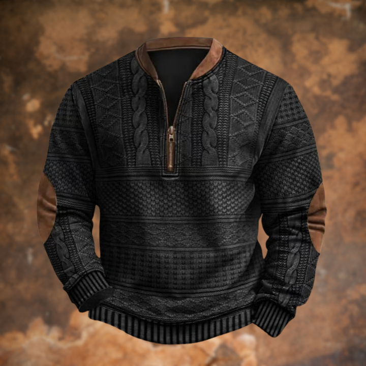Black textured knit pullover with brown collar trim, zipper pull and elbow patches.