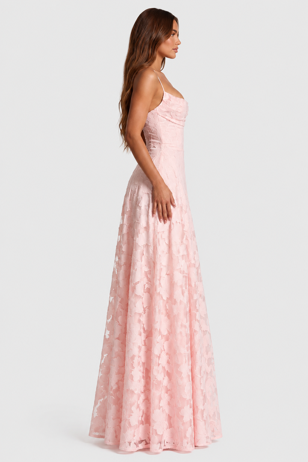 Pale pink floral lace dress with a draped bodice and flowing A-line skirt, side view.