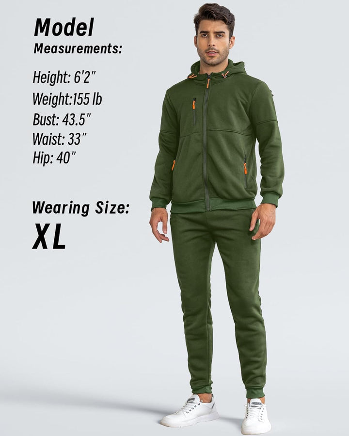 Model standing front view in the green hooded jacket and joggers, with size and body info listed 14