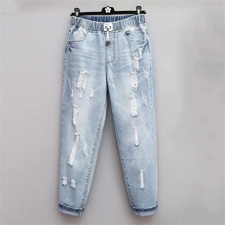 Damen Boyfriend Jeans, hellblau, zerrissen, elastischer Bund, modische Freizeitkleidung.