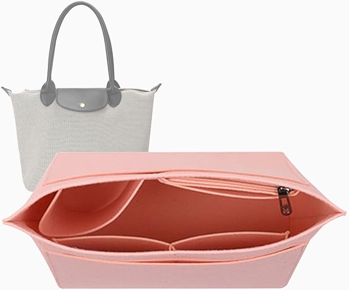 Black felt organizer insert with several inner compartments and a zippered pocket, shown in front of a tote.
