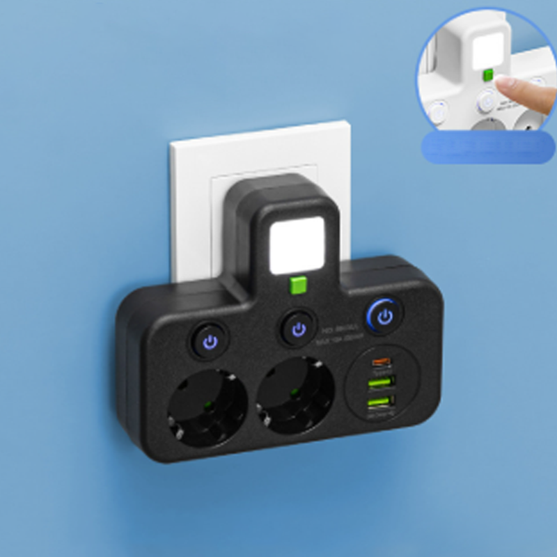 Black power strip with two sockets, USB-C and two USB ports, night light on, front view.