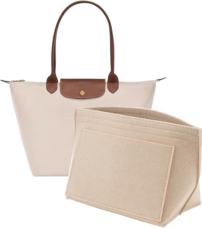 Black felt organizer insert with a stitched front pocket, shown beside a tote.